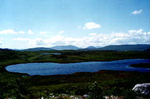 Magnificent view from Bunnagippaun hill with the Connemara Hills in the distance