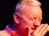 Don Baker, Irish blues harp maestro, musician and actor playing the blues