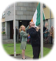 UDC Cathaoirleach Miriam McGillycuddy and Town Clerk Michael McMahon raising the National Flag on Easter Sunday morning