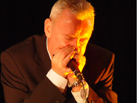 Don Baker, Irish blues harp maestro, musician and actor playing the blues