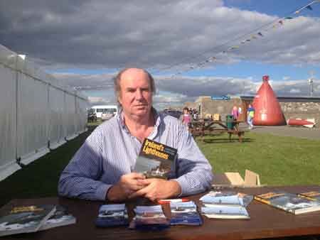 John Eagle with his book