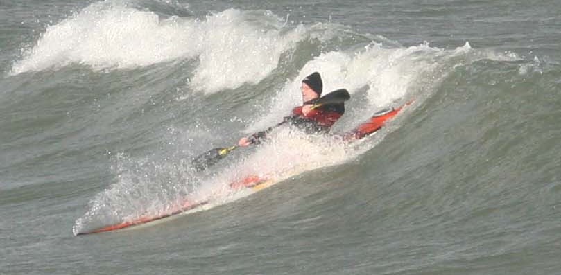 worried sea surfing paddler