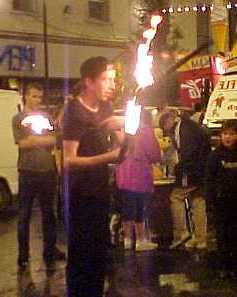 Fire-Juggler in Denny Street 
on Friday night