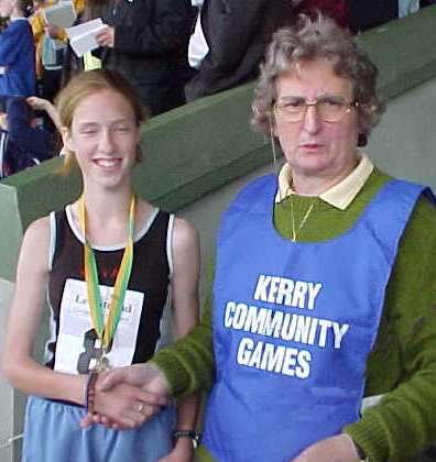 Amanda O'Connell (Tralee) accepting her gold medal 
in the Long-Jump U-14 final on Saturday.
